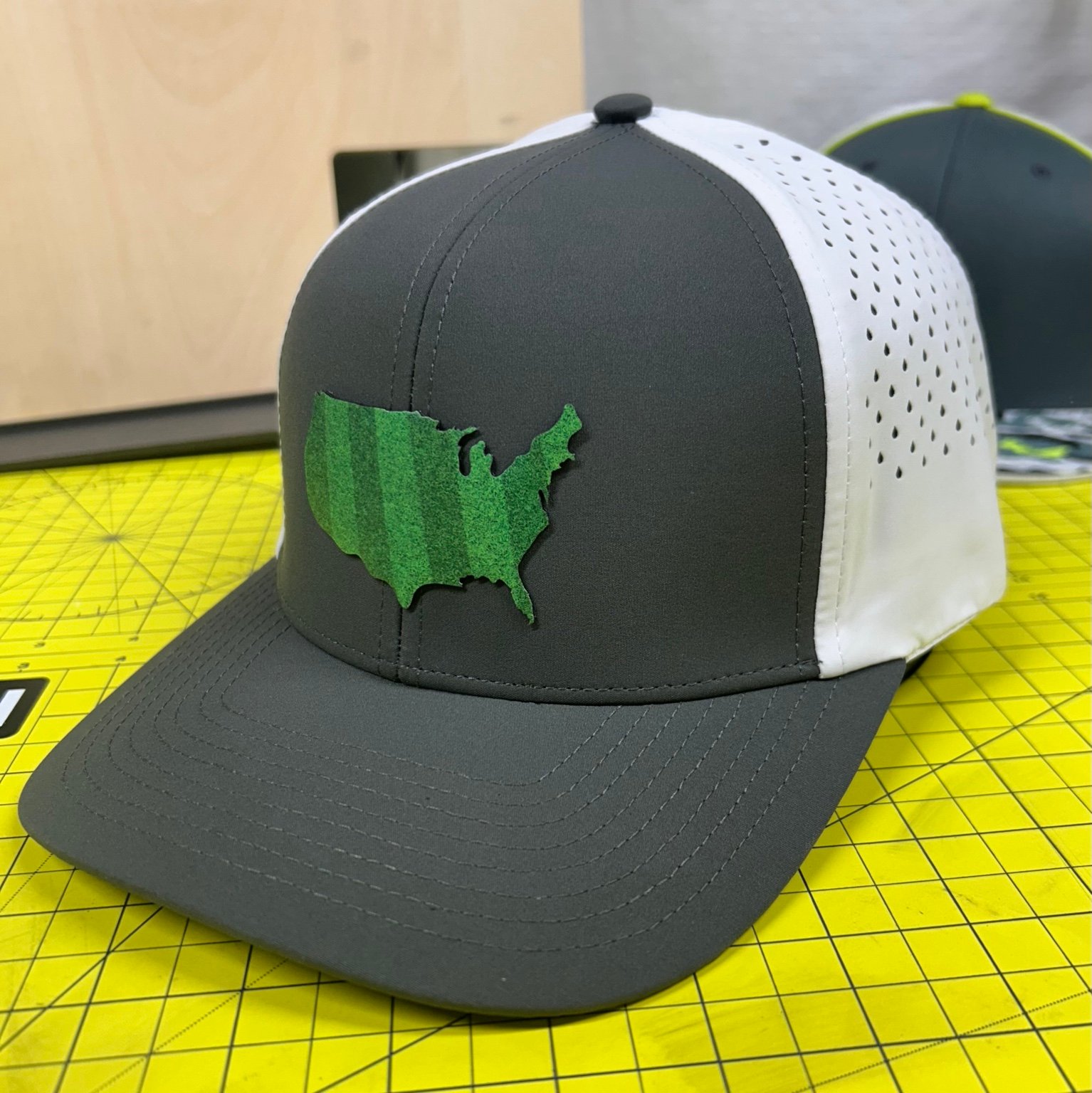 Custom green USA patch performance hat by Region Hat Co.